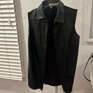 Leather vest- back of vest is material not leather